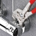 Pince clé gainée 150mm avec bouton poussoir